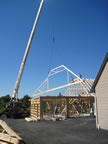 Our small boom truck setting garage attic trusses